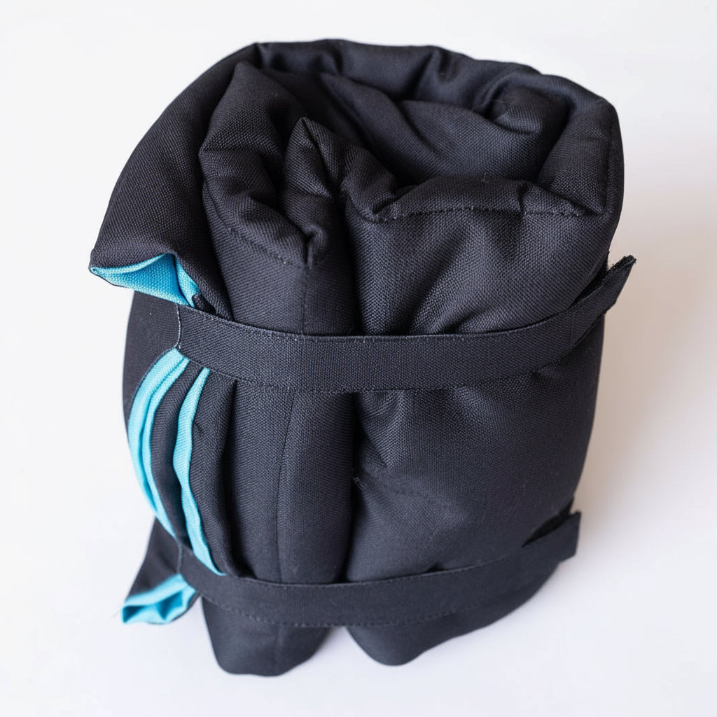 Double-sided dog training mat showing both textured surfaces for grip and comfort, designed for calm training sessions with dogs at home or on the go.